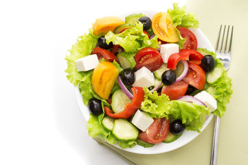 fresh vegetable salad isolated on white background