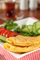 Simple egg omelette with herbs Seasonal Greenery Tomato Cucumber and Tea