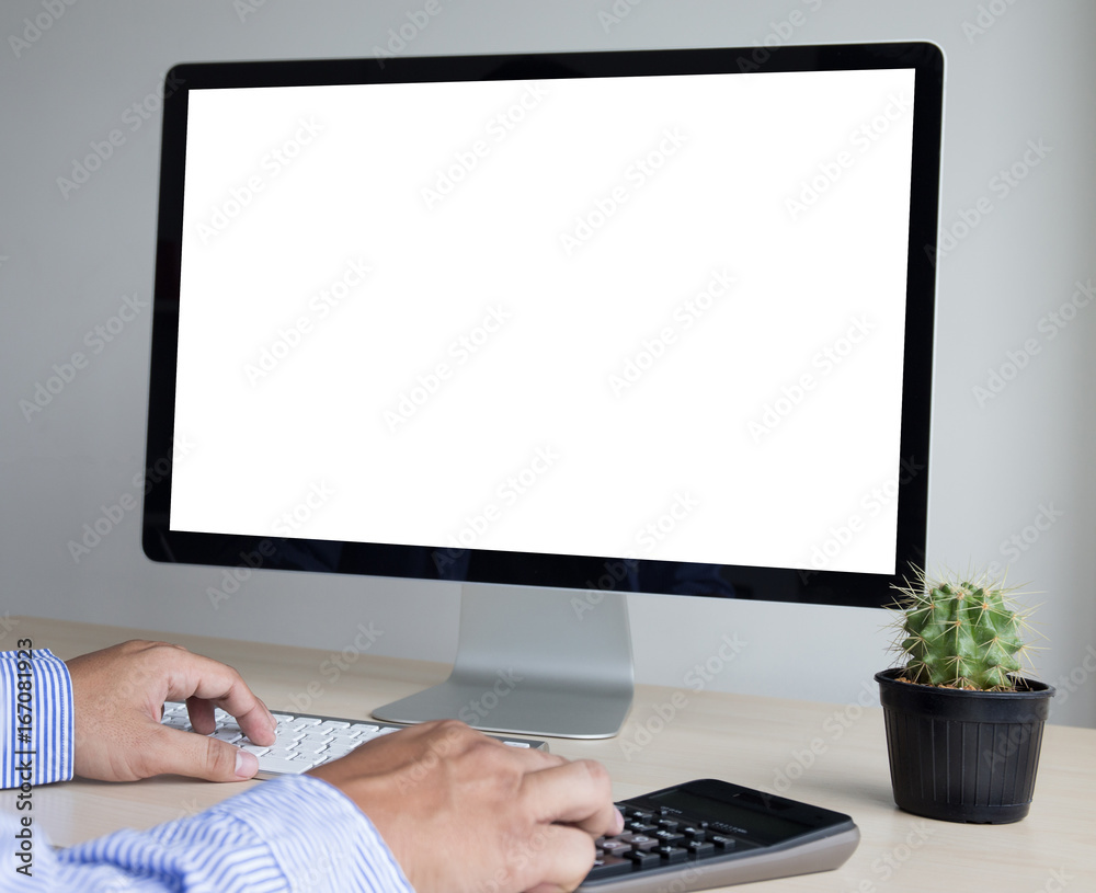 Wall mural young man working businessman using a desktop computer of the blank screen