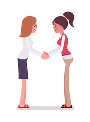Fototapeta premium Female clerks handshaking with both hands