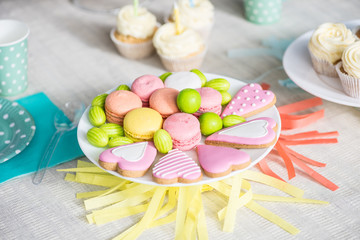 close-up view of delicious colorful cookies at festive table