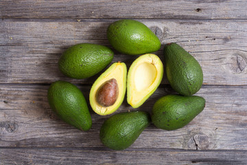 Fresh avocado on wooden background