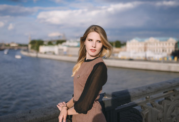 Outdoors portrait of beautiful young woman. Selective focus.