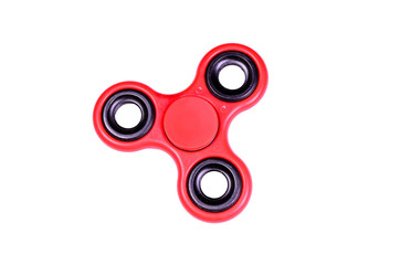 Red fidget spinner isolated on white