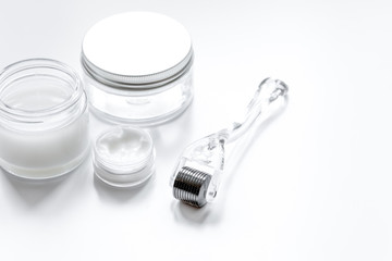 concept beautician desktop with mezoroller - mesotherapy on whit