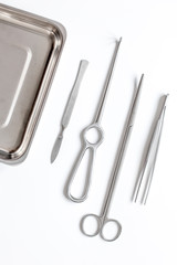 instruments for plastic surgery on white background top view