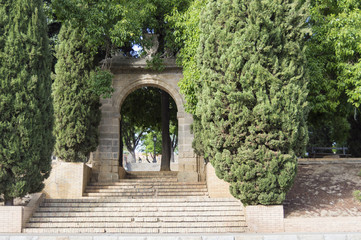 Fototapeta na wymiar Arch of triumph, entrance gate to the Alameda vieja in Jerez de la Frontera, photo taken on August 7, 2017. 