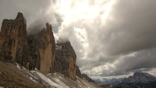 Time lapse clouds between three peaks dolomites 4k 11900