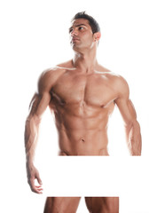 Muscular bodybuilder guy standing and posing on white background