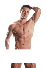 Fototapeta premium Muscular bodybuilder guy standing and posing on white background