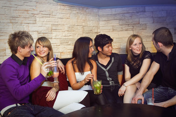 Group Of Young People In A Nightclub
