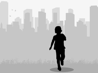 silhouette of children boys on city background