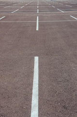 Obraz premium Empty open air parking with gray asphalt and mark up