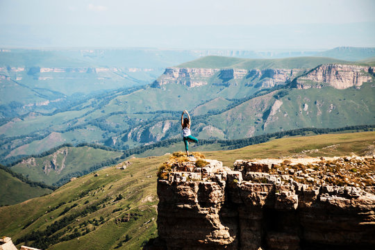 Yoga pose on the cliff