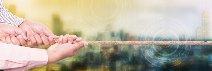 Businessman team ppull rope