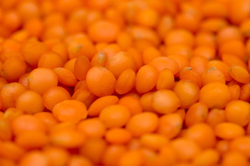 Red lentils as background. macro