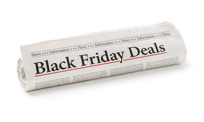 Rolled newspaper with the headline Black Friday Deals