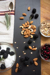 Snack with fresh berries, blueberries and almonds