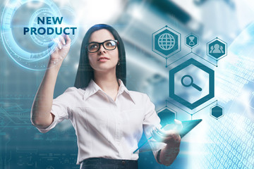 The concept of business, technology, the Internet and the network. A young entrepreneur working on a virtual screen of the future and sees the inscription: New product
