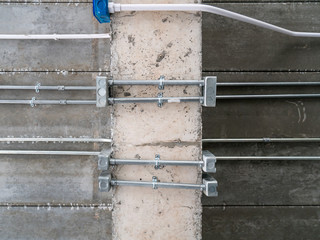 electric wire on the raw concrete ceiling,detail of construction,system building