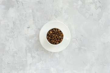 Fototapeta na wymiar Cup with coffee beans