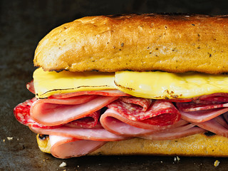 rustic deli cold cuts sandwich
