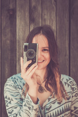 Female with retro camera