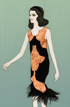 Fashion Model on Catwalk wearing Orange and Black Dress