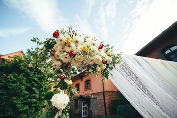 Flower decorations for the wedding ceremony outdoor.
