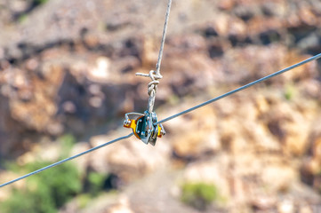 Equipment for safe trolling on a steel cable. Zipline.