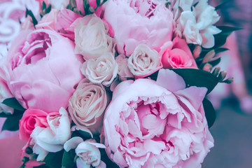 wedding bouquet with peonies and roses