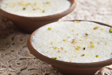 Close-up of phirni served in bowls on table