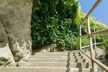 Cement steps outside alaong the cornwall coast in the summertime