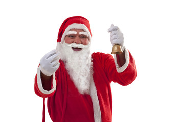 Portrait of cheerful Santa Claus gesturing while holding bell over white background 
