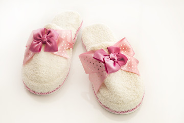 Pair of blank white home slippers. Bed shoes accessory footwear