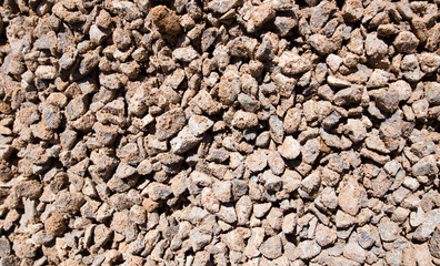 Crushed stone with sand as a background