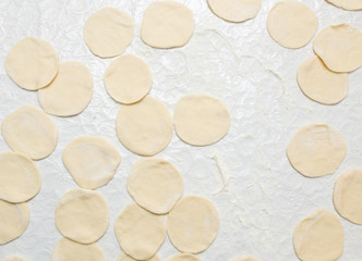 Cook cooks dough for pieces