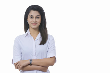 Portrait of confident Indian businesswoman against white background