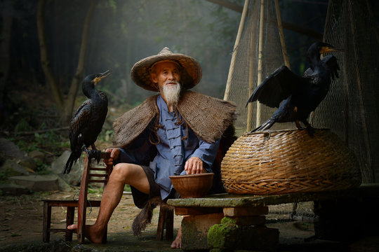 Cormorant Fisherman And Teal After A Fishing