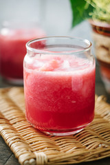Watermelon smoothie in glasses with slices of watermelon