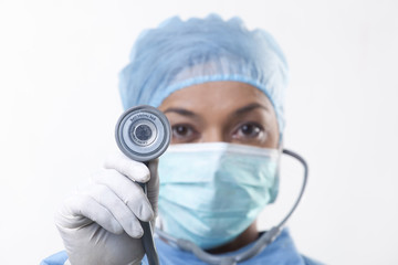 Portrait of female doctor holding stethoscope 
