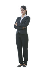 Obraz na płótnie Canvas Full length portrait of well-dressed businesswoman against white background