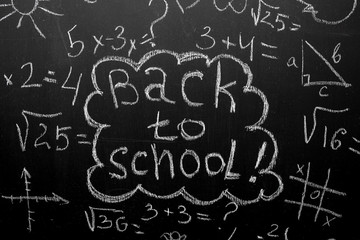 Fototapeta na wymiar Back to school concept.blackboard with formulas 