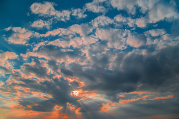 dramatic sunset with clouds and sun rays