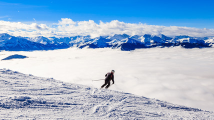 Naklejka na ściany i meble Skier on the slopes of the ski resort Soll, Tyrol, Austria