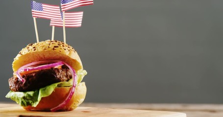 Hamburger decorated with american flag - Powered by Adobe