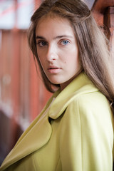 Fototapeta premium Portrait of beautiful young woman wearing in autumn coat
