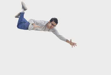 Young man trying to catch