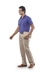 Fototapeta premium Young man with a book