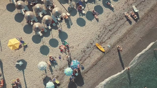 Aerial shooting. Look from above at people bathing in the sea